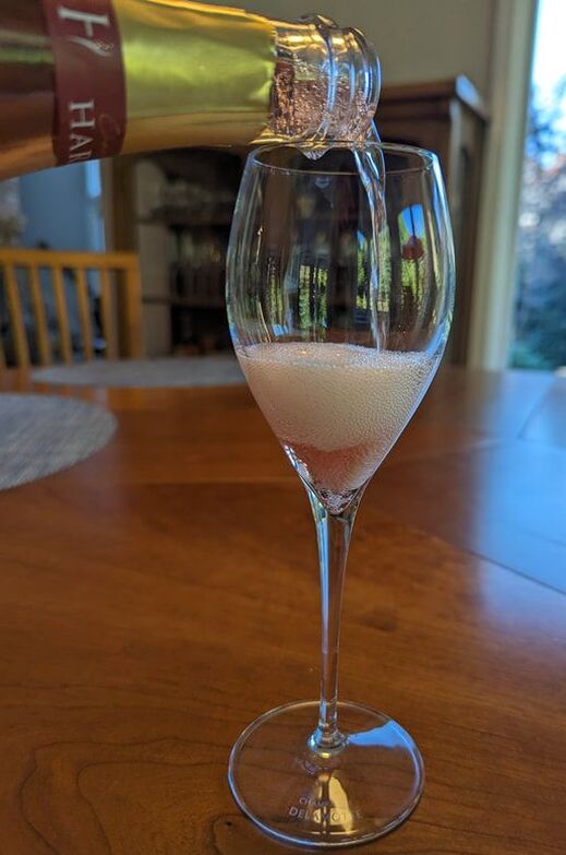 Pouring Champagne into a glass